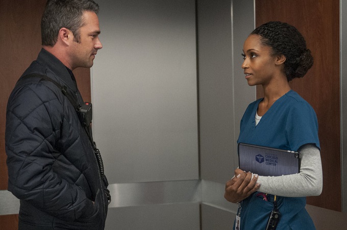 CHICAGO MED -- "Malignant" Episode 105 -- Pictured: (l-r) Taylor Kinney as Kelly Severide, Yaya DaCosta as April Sexton -- (Photo by: Matt Dinerstein/NBC)