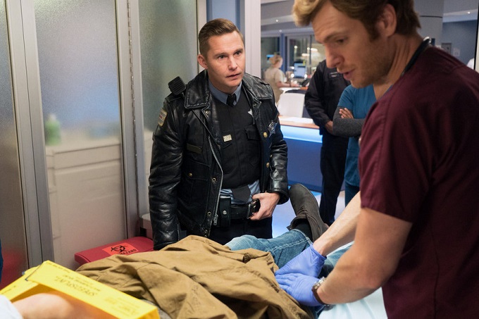 CHICAGO MED -- "Saints" Episode 107 -- Pictured: (l-r) Brian Geraghty as Roman, Nick Gehlfuss as Dr. Will Halstead -- (Photo by: Elizabeth Sisson/NBC)
