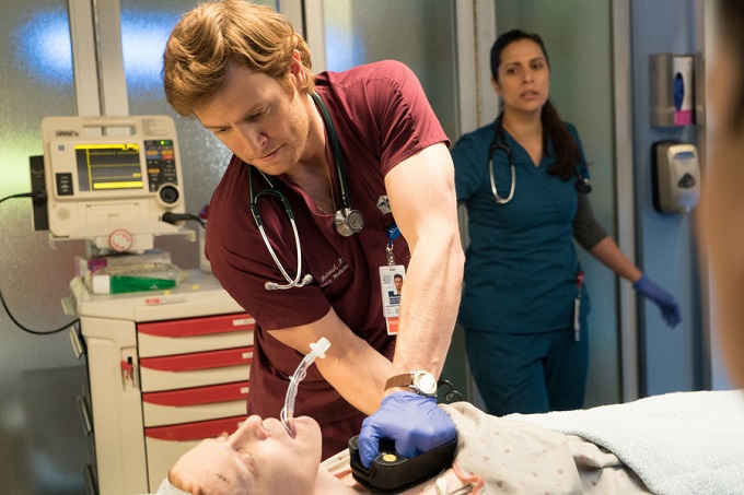 CHICAGO MED -- "Choices" Episode 109 -- Pictured: (l-r) Nick Gehlfuss as Dr. Will Halstead, Lorena Diaz as Nurse Doris -- (Photo by: Elizabeth Sisson/NBC)