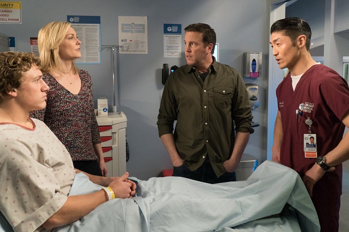 CHICAGO MED -- "Clarity" Episode 110 -- Pictured: (l-r) Lochlyn Munro as Jack Copper, Katherine Keberlein as Joan Cooper, Damian Conrad Davis as Bret "Bear" Copper, Brian Tee as Dr. Ethan Choi -- (Photo by: Elizabeth Sisson/NBC)