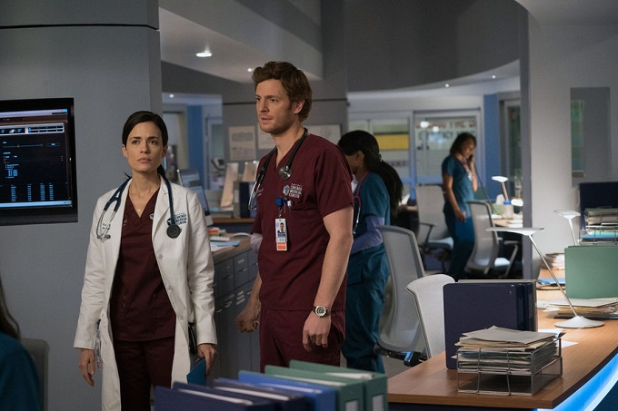 CHICAGO MED -- "Reunion" Episode 108 -- Pictured: (l-r) Torrey DeVitto as Dr. Natalie Manning, Nick Gehfuss as Dr. Will Halstead -- (Photo by: Elizabeth Sisson/NBC)