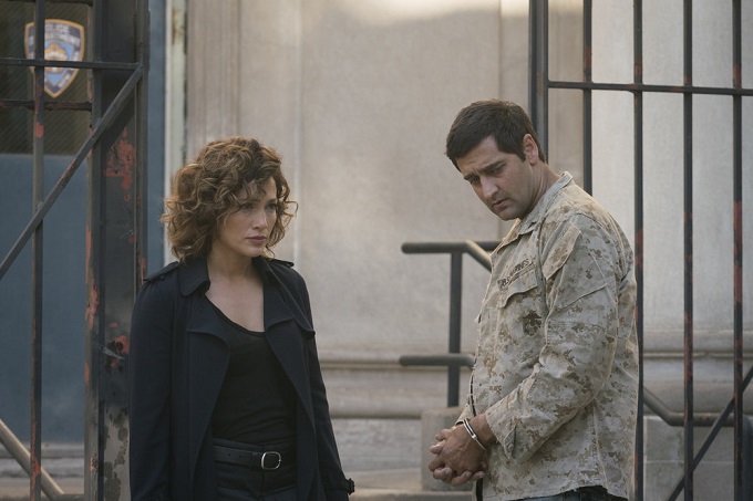 SHADES OF BLUE -- "What Devil Do" Episode 110 -- Pictured: (l-r) Jennifer Lopez as Det. Harlee Santos, Donnie Keshawarz as Nate -- (Photo by: Michael Parmelee/NBC)