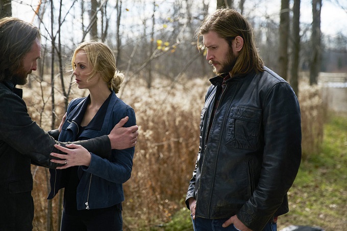 BITTEN -- "Tili Tili Bom" Episode 308 -- Pictured: (l-r) Greg Bryk as Jeremy Danvers, Laura Vandervoort as Elena Michaels, Greyston Holst as Clay Danver -- (Photo by: Shane Mahood/Syfy/She-Wolf Season 3 Productions)