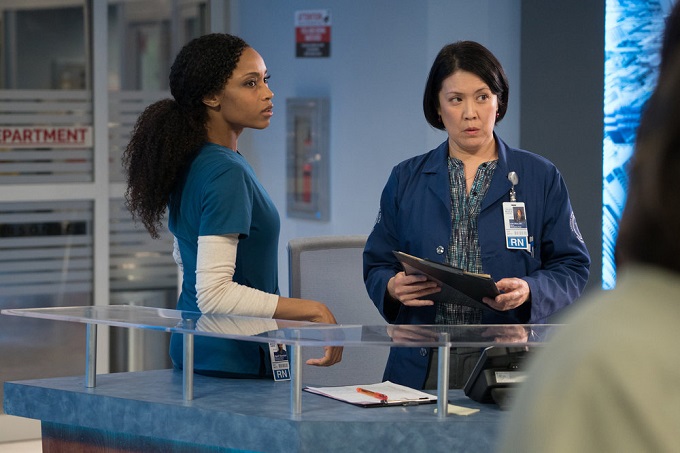 CHICAGO MED -- "Hearts" Episode 114 -- Pictured: (l-r) Yaya DaCosta as April Sexton, Tonray Ho as Nurse Leah -- (Photo by: Elizabeth Sisson/NBC)