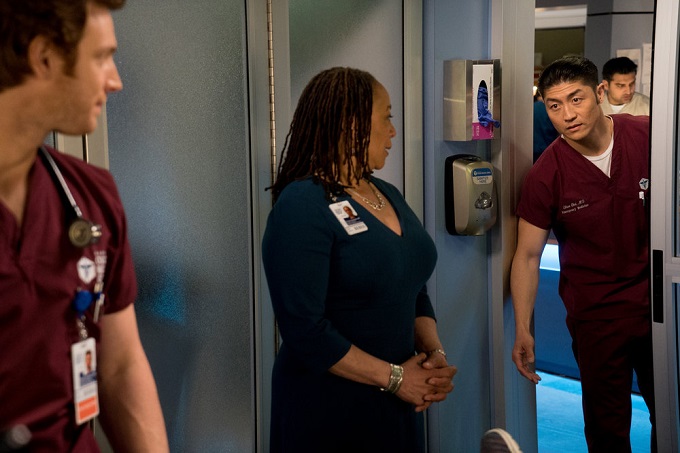CHICAGO MED -- "Timing" Episode 118 -- Pictured: (l-r) Nick Gehlfuss as Dr. Will Halstead, S. Epatha Merkerson as Sharon Goodwin, Brian Tee as Dr. Ethan Choi -- (Photo by: Elizabeth Sisson/NBC)