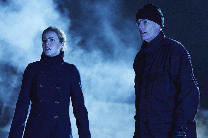 12 MONKEYS -- "Fatherland" Episode 210 -- Pictured: (l-r) Amanda Schull as Cassandra Railly, Matt Frewer as Dr. Isaac Kirschner -- (Photo by: Ben Mark Holzberg/Syfy)