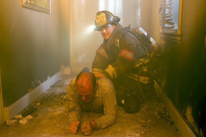 CHICAGO FIRE -- "I Held Her Hand" Episode 505 -- Pictured: (l-r) Michael Nanfria as Darin Whitney, Taylor Kinney as Kelly Severide -- (Photo by: Parrish Lewis/NBC)